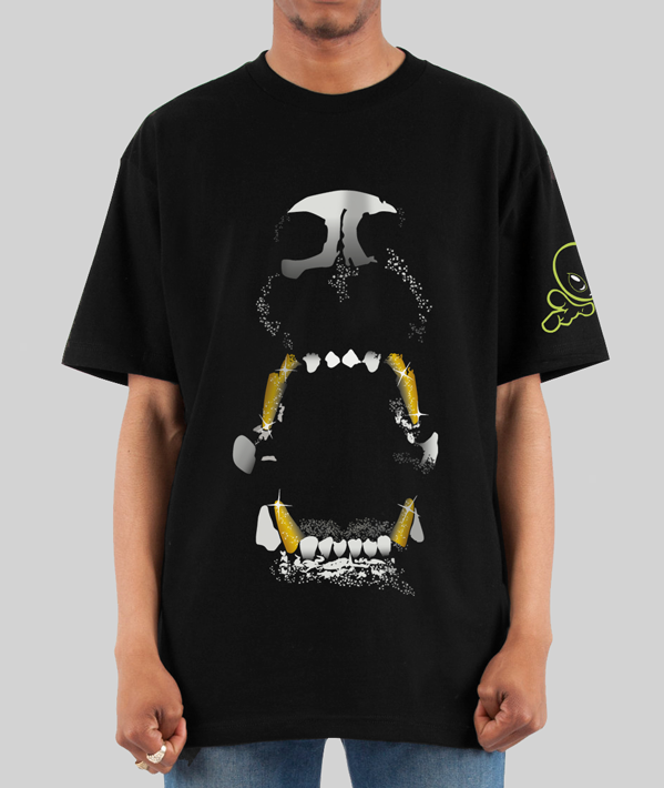 A man wearing a black t-shirt featuring a hand-illustrated design of an aggressive dog baring its teeth, with gold fangs highlighted for a bold, edgy look.