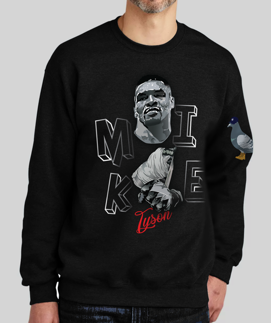 Front view of a man wearing a black sweatshirt featuring a design of Mike Tyson wrapping his hands, capturing his intense focus and readiness for the ring.